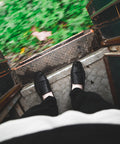 standing on a train step