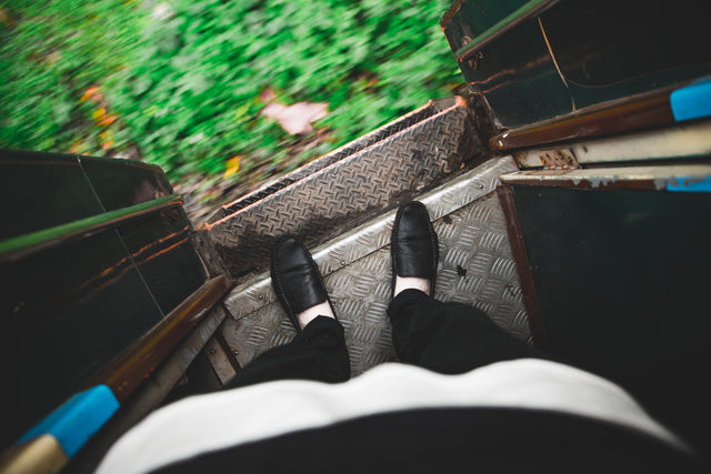 standing on a train step