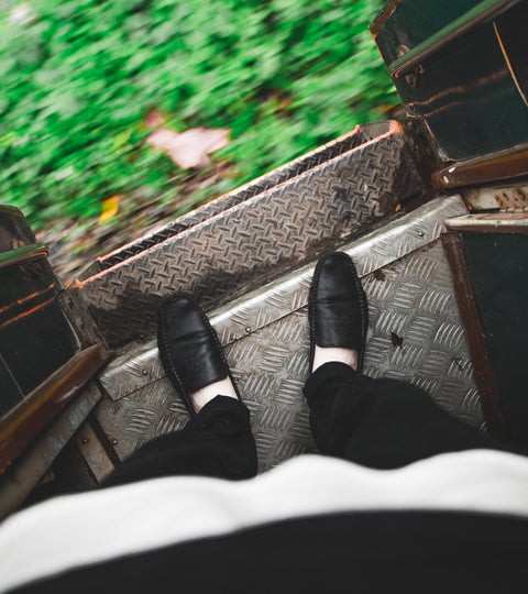 standing on a train step